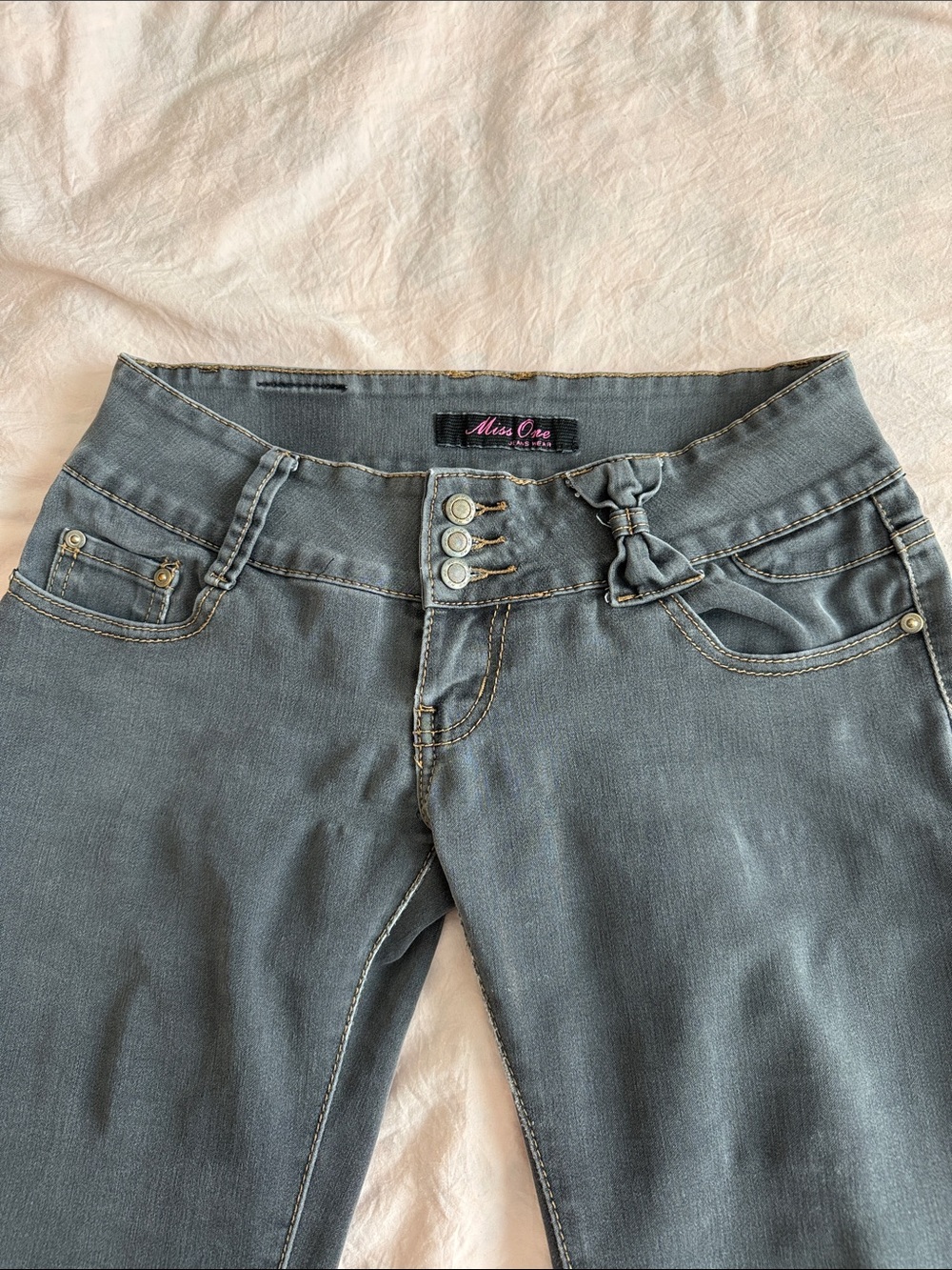 Low rise Y2K Miss One Grey Bow Skinny Jeans